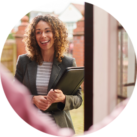 Saleswoman at the step of a seniors door