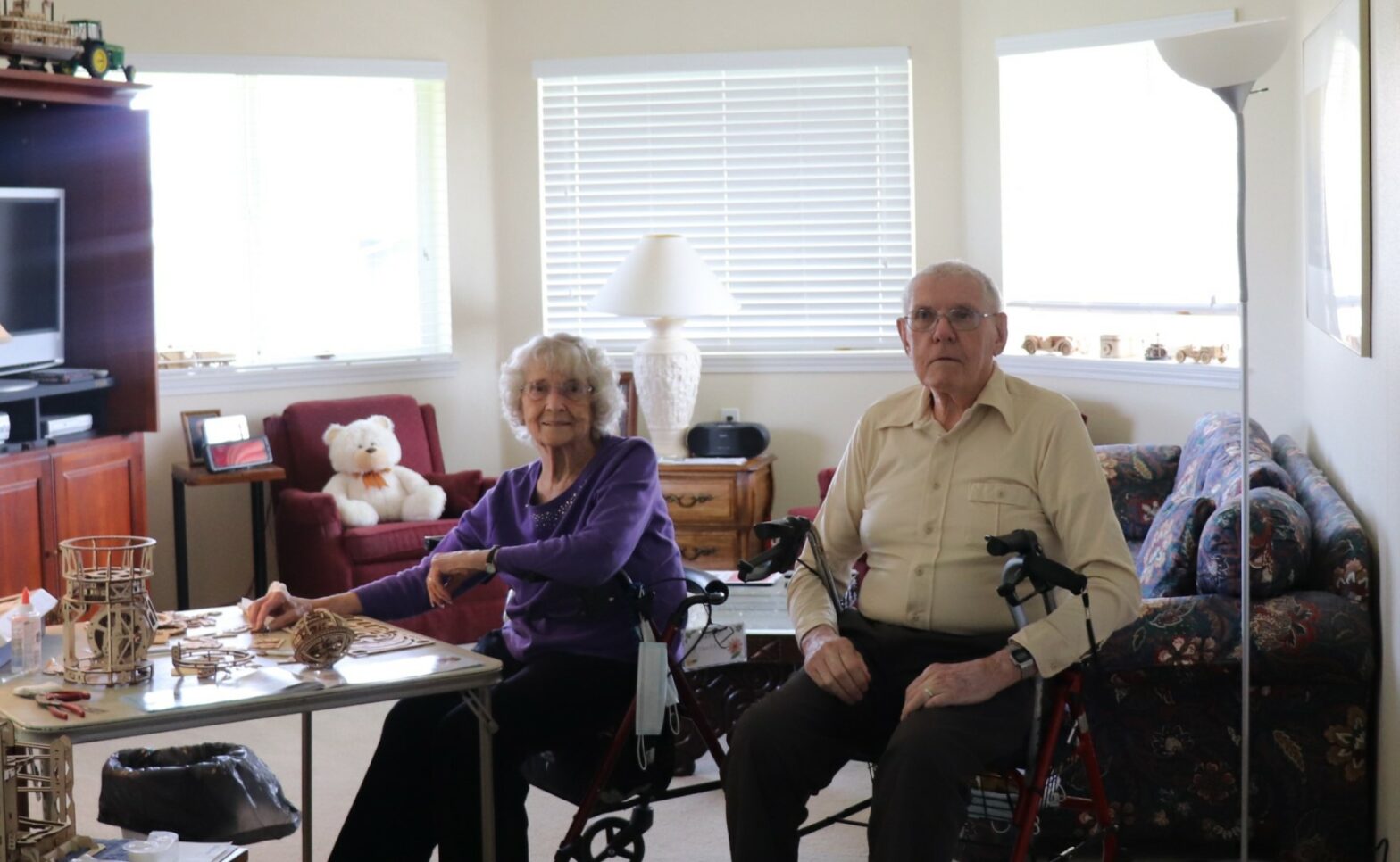 Lloyd Lane and Anita Siglin, holiday residents sitting in their living room apartment