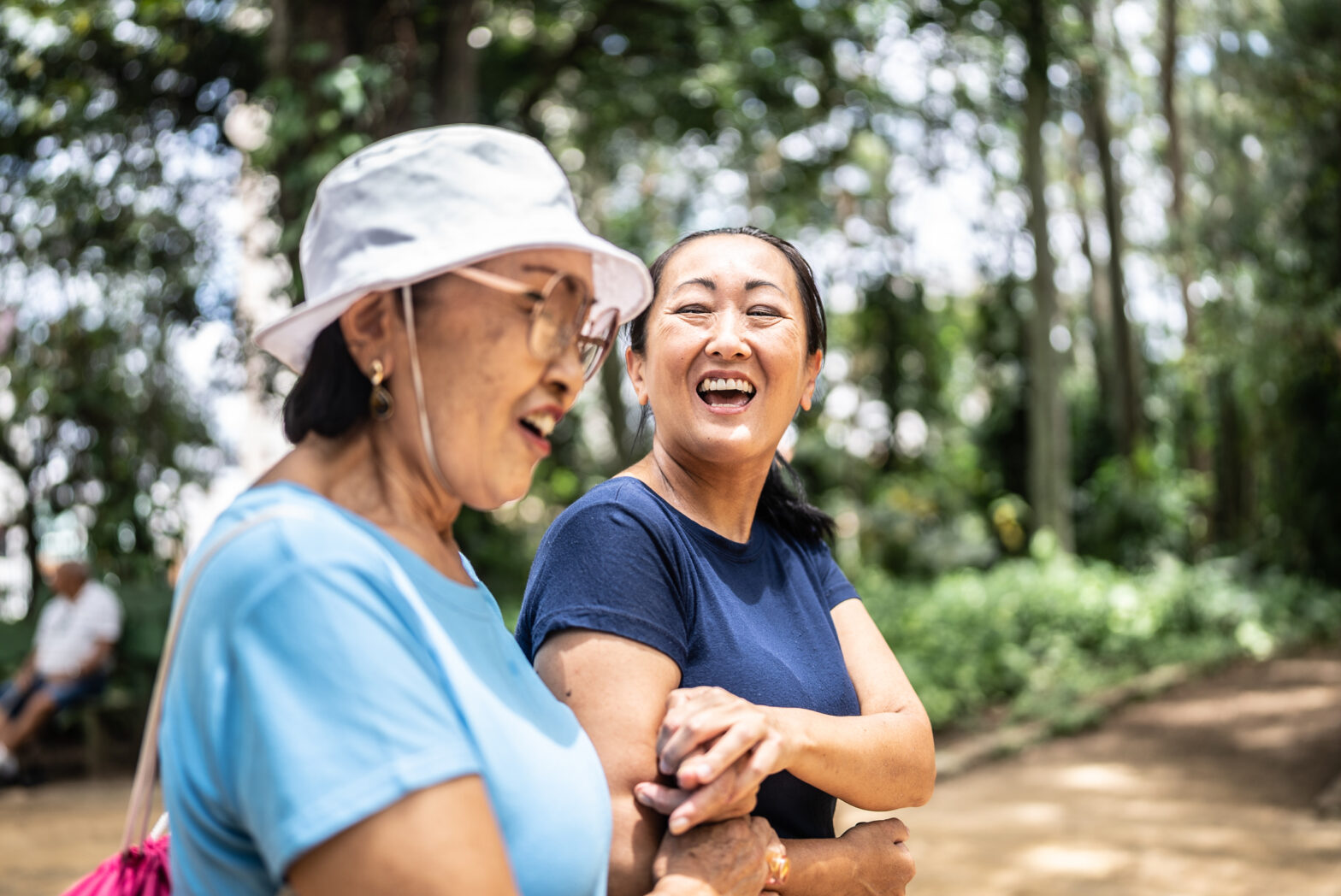 Mother and daughter talking on the public park