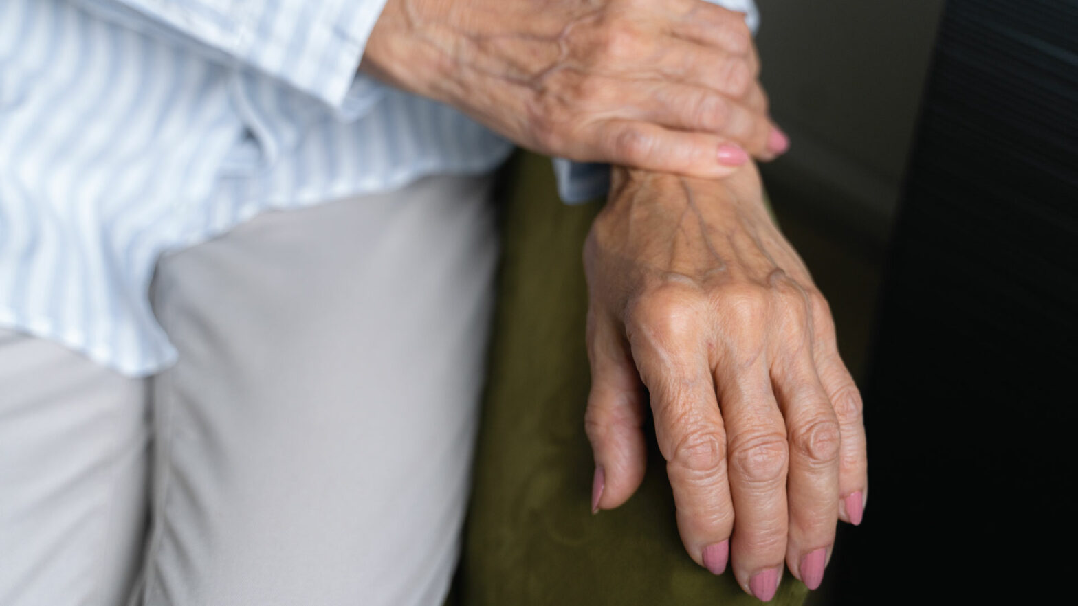 Senior holding their wrist