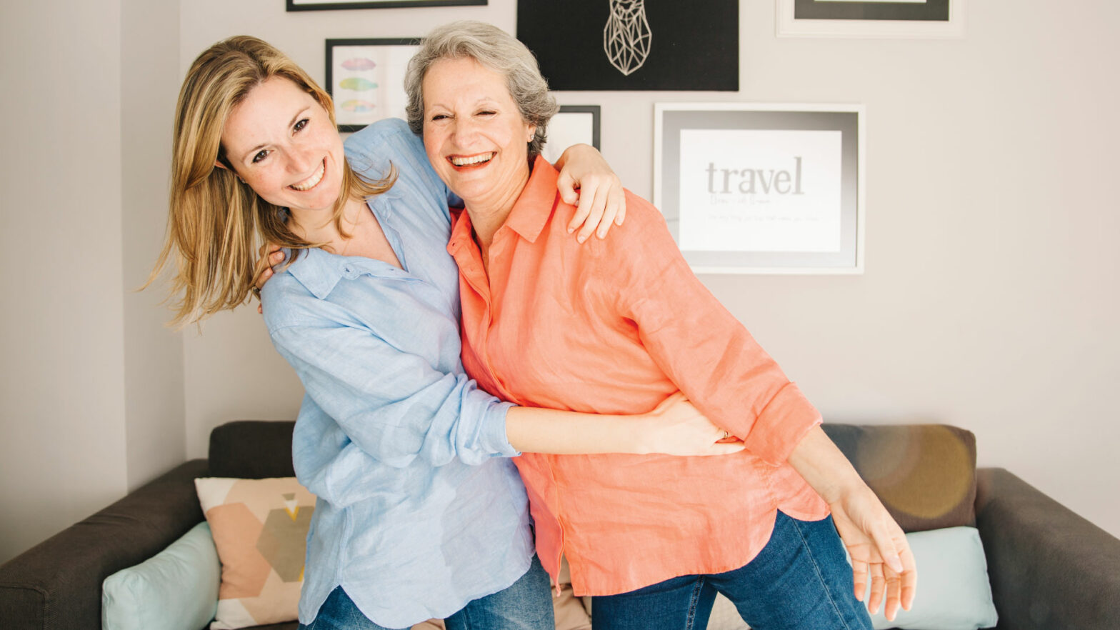 Senior woman hugging her adult daughter