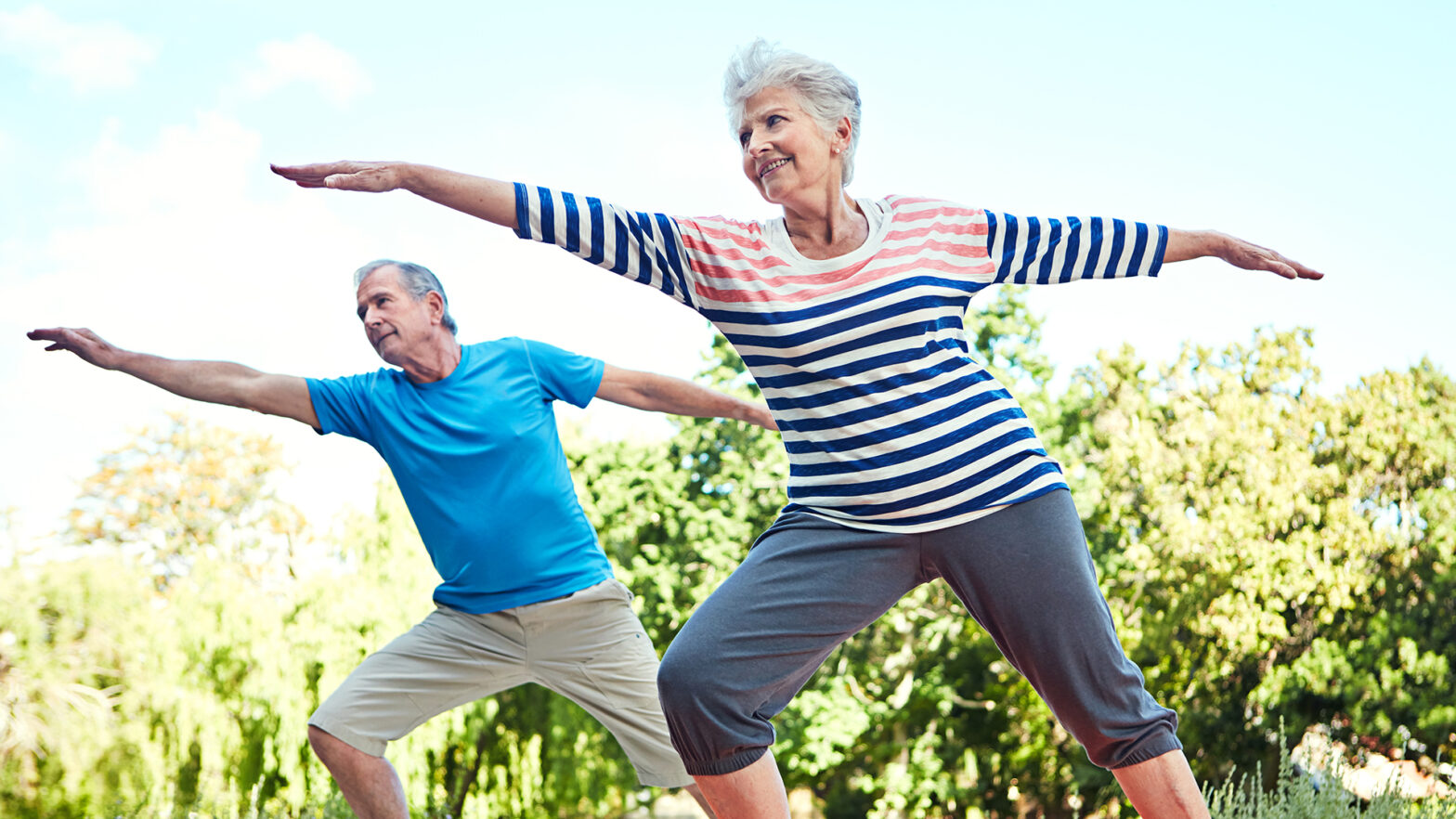 Shot of a senior couple doing yoga together