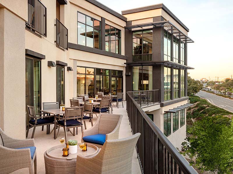 Exterior patio at Atria Newport Beach