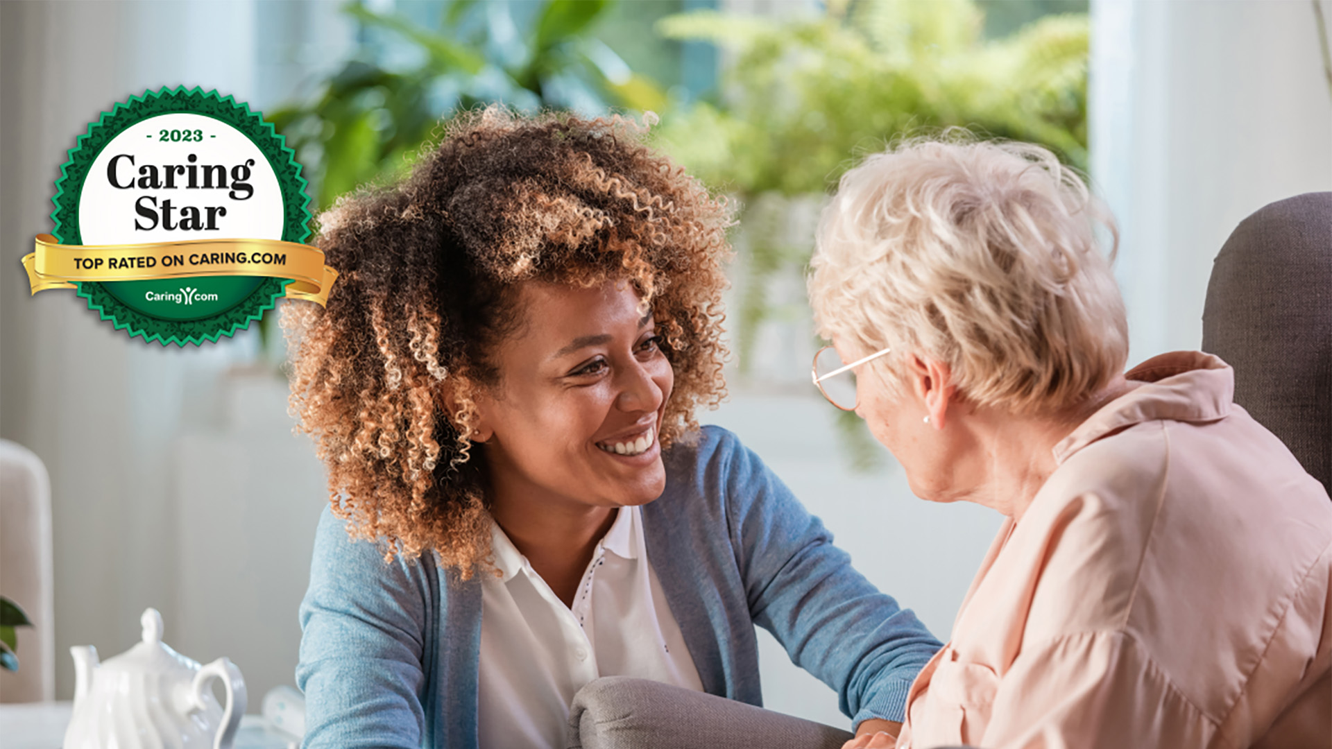 Employee and resident talking in a senior living community